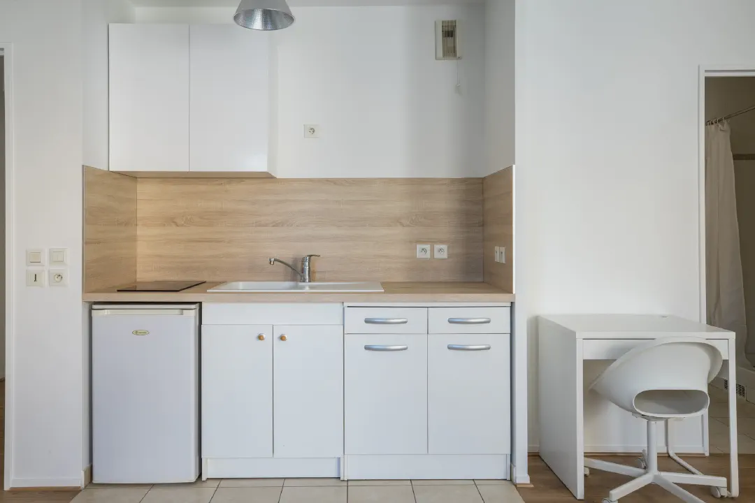 Photographier l’aménagement d’un studio : montrer comment un petit espace devient fonctionnel