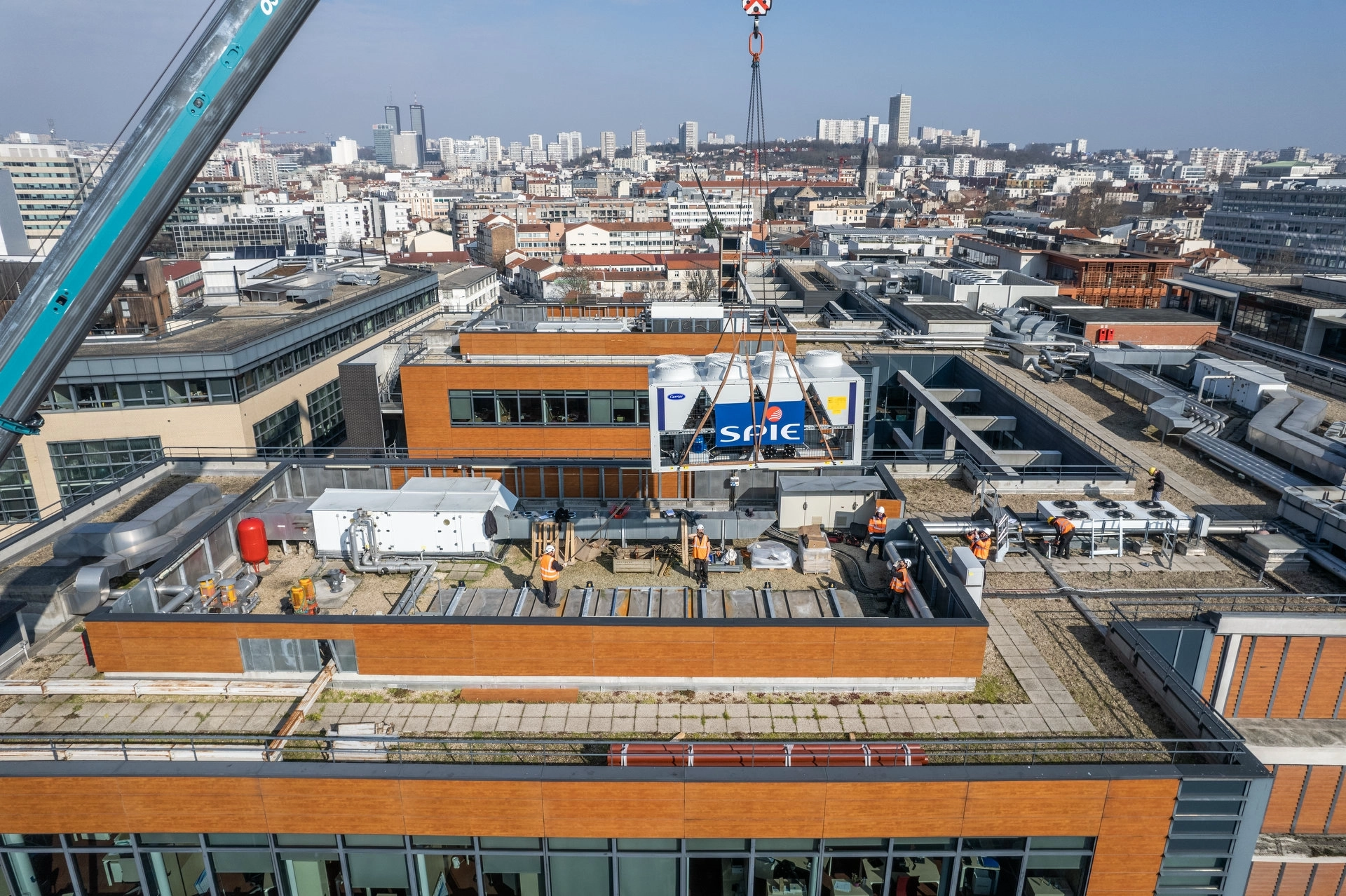 Construction progress photography: SPI crane lifting operation